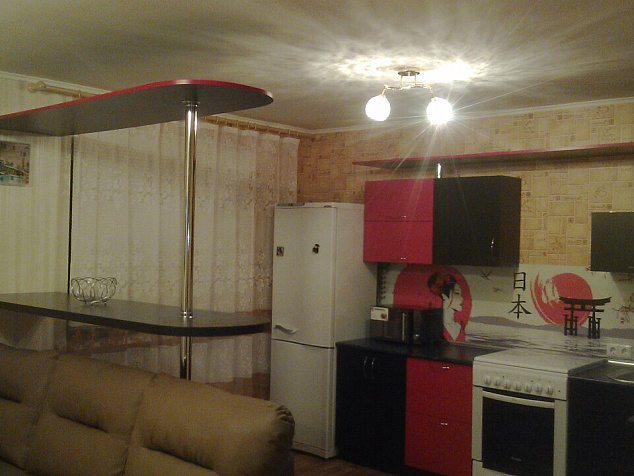 Угловая кухня из ЛДСП с барной стойкой " Черное - красное" (пример 509).